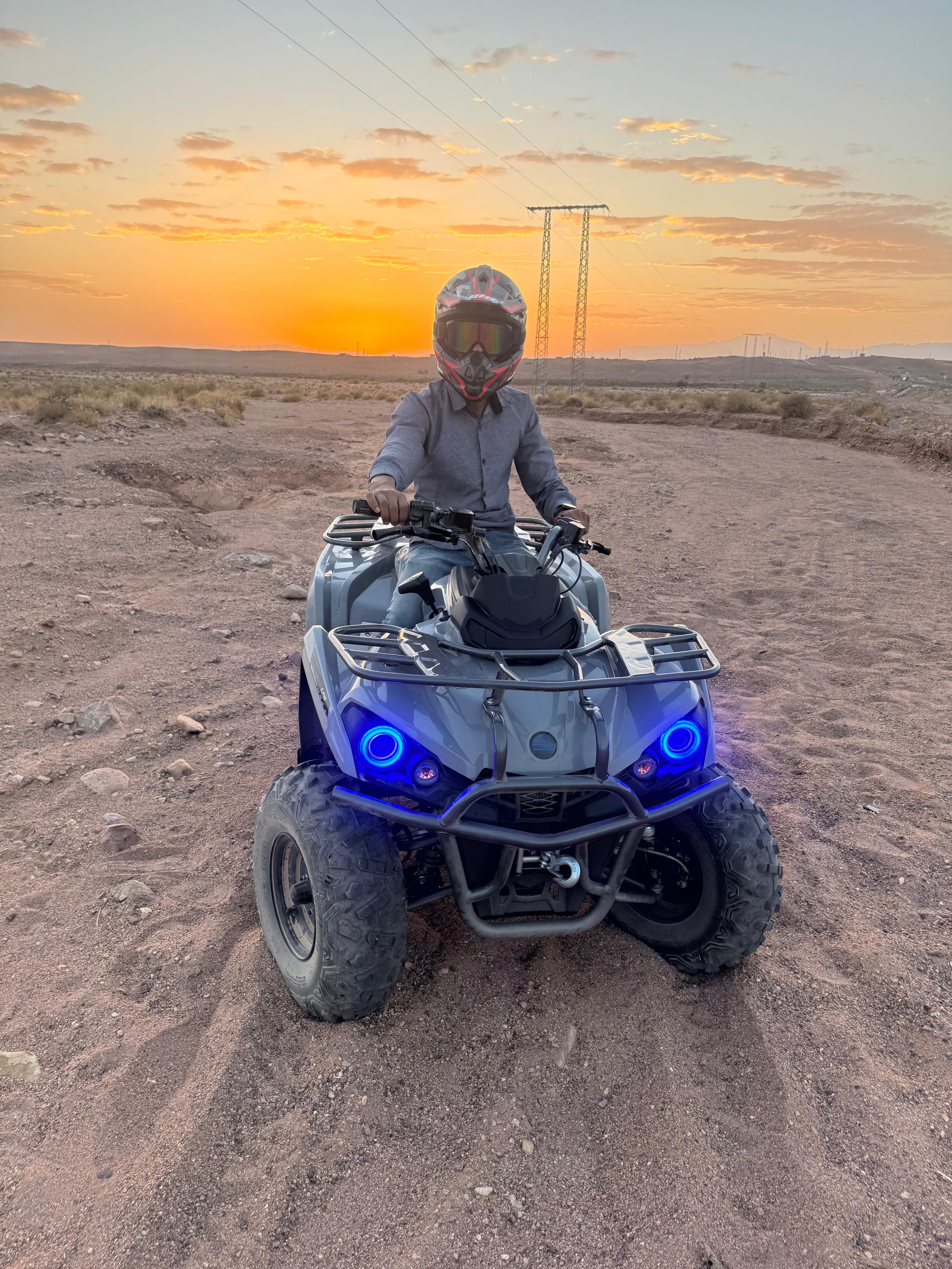 Quad bikes lined up in the desert